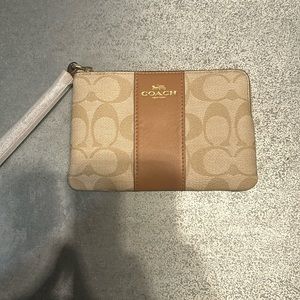 Coach Corner Zip Wristlet In Signature Canvas